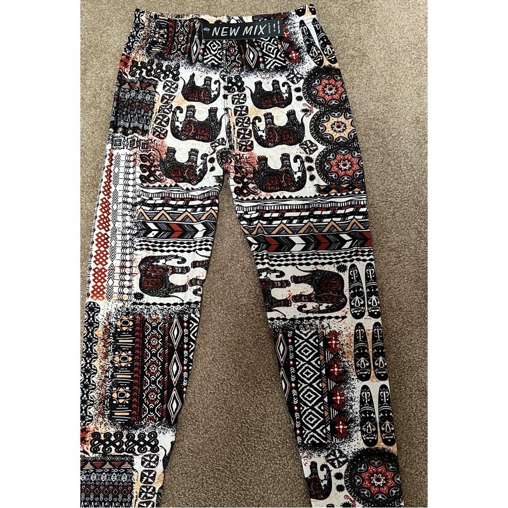 NWT. 2 pairs leggings. One size.